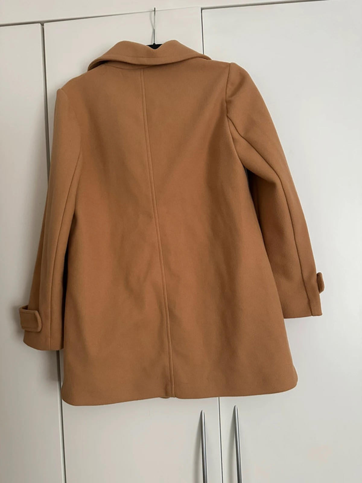 Tan coat