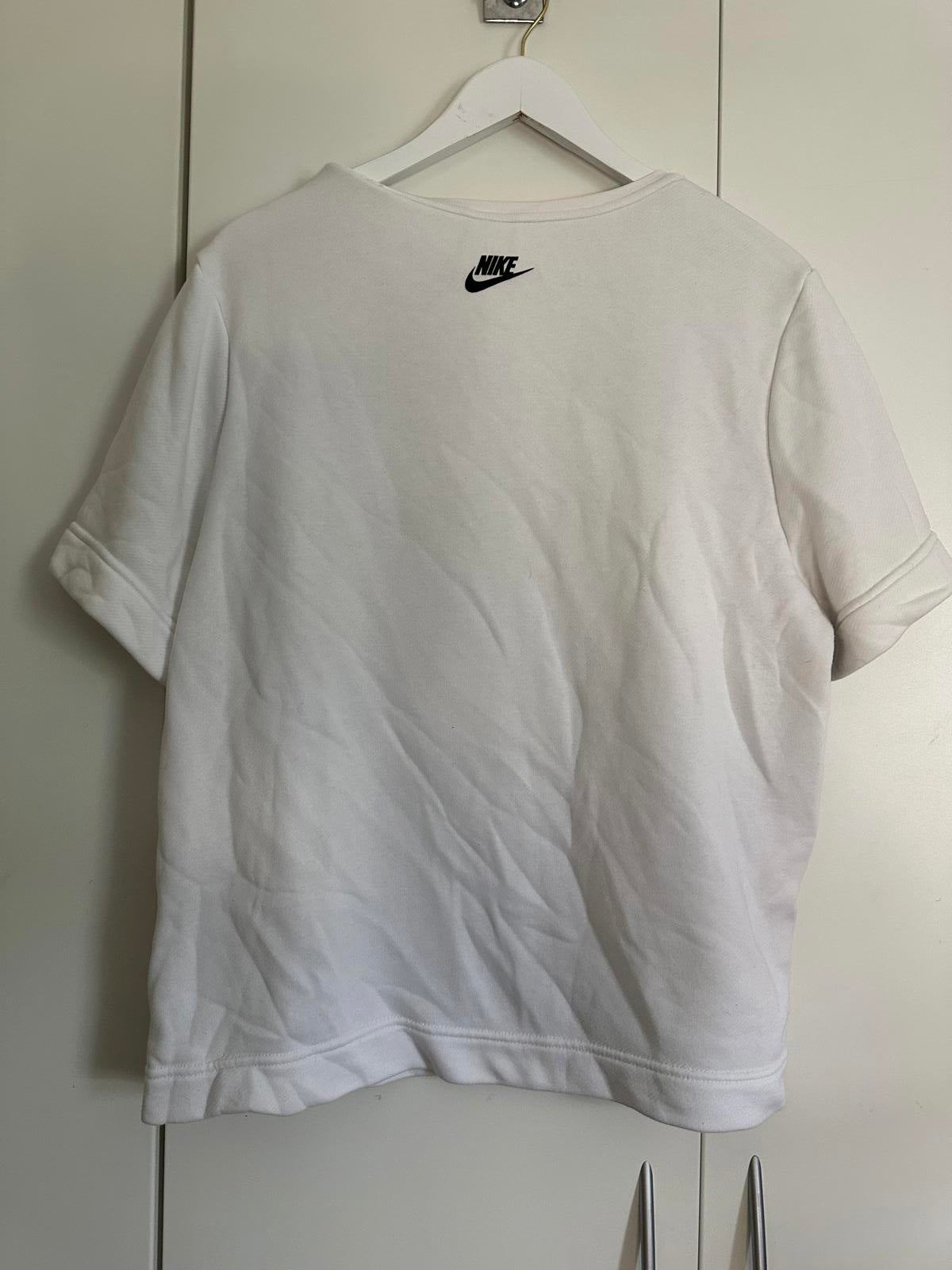Nike White T-Shirt with Oversized Black Logo Print